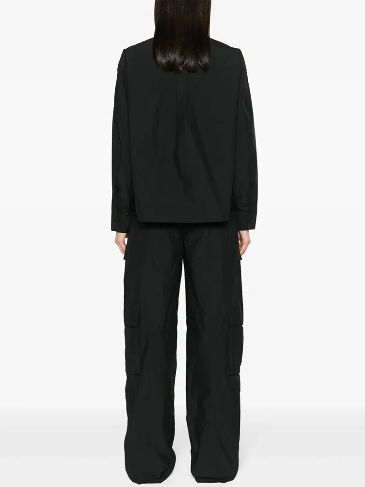 TWOTWINSTYLE Minimalist Spliced Pocket Jumpsuit For Women Lapel Long Sleeve High Waist Patchwork Button Loose Jumpsuits Female