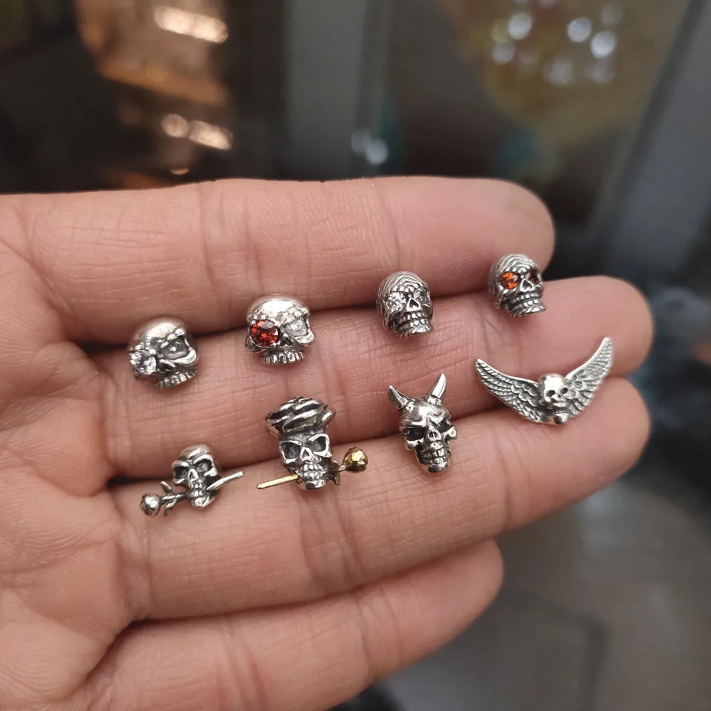 

Thai silver 925 sterling silver trendy brand cross wing star Daisy butterfly Skull hiphop feather cross punk earringmen women