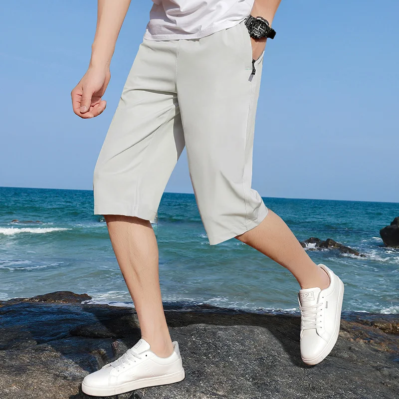 Summer New Solid Color Fashion Elastic Waist Straight Pants Men High Street Pockets Quick Drying All-match Calf-Length Pants