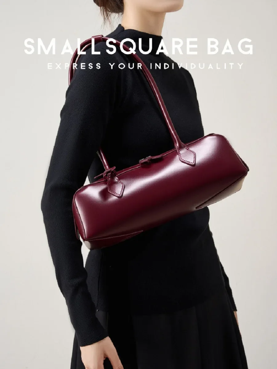 18185-fde1d2.jpg 2025 Elegant Long-Strip Leather Bag