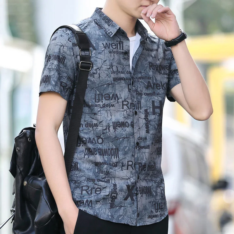 Fashion Lapel Button All-match Printed Asymmetrical Shirts Men's Clothing 2023 Summer New Casual Tops Short Sleeve Korean Shirt