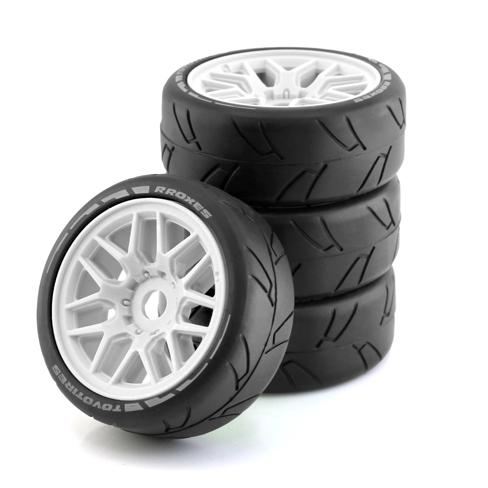 Vue d'ensemble du lot de 4 pneus RC 1/8 Rallye Drift aux couleurs noir, blanc et vert.