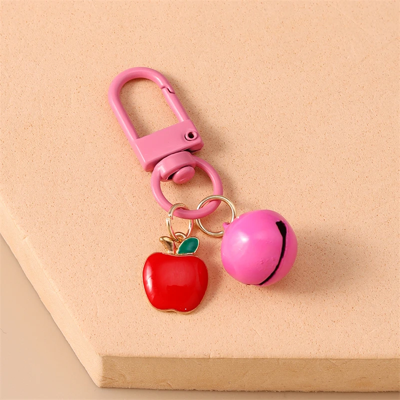 Niedliche Frucht-Glocken-Schlüsselanhänger aus Emaille: Erdbeere, Orange, Traube – Schlüsselringe für Damen und Herren, Auto- und Handtaschen-Schlüsselanhänger, DIY-Schmuckgeschenk – Detail 9
