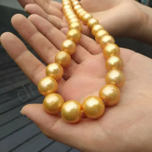 AAAA Lustrous 11 12mm Round South Sea 