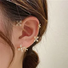 

Gold four-leaf high-end sense no ear holes light luxury temperament full drill ear bone earrings puncture-free ear clip hook