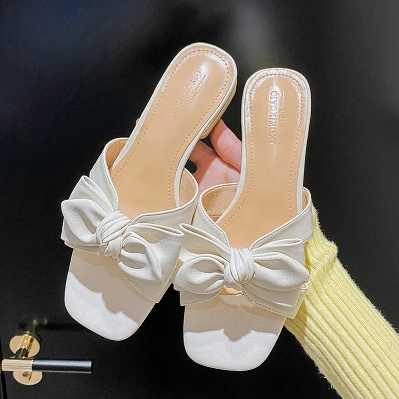 

New for summer 2023 Low-heeled slippers for women Fashion brand design casual White bowknot sandals Big yards of shoes 41-43