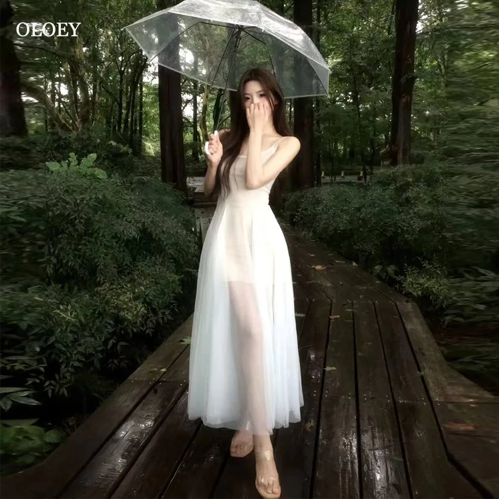 

OLOEY Simple White Tulle A Line Illusion Korean Evening Gown Dress O-Neck Spaghetti Strap Ankle Length Sleeveless Prom Gowns