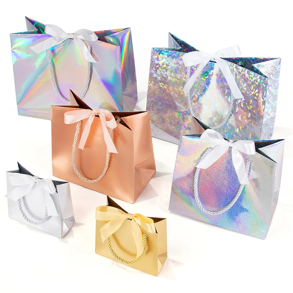 Laser gift paper bag holiday party gold and silver packaging carton ribbon small paper bag