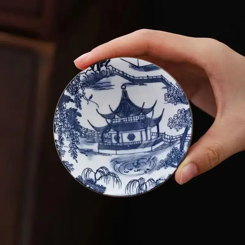 Handcrafted Blue & White Porcelain Teacup - Dragon, Phoenix, and Pavilion Design