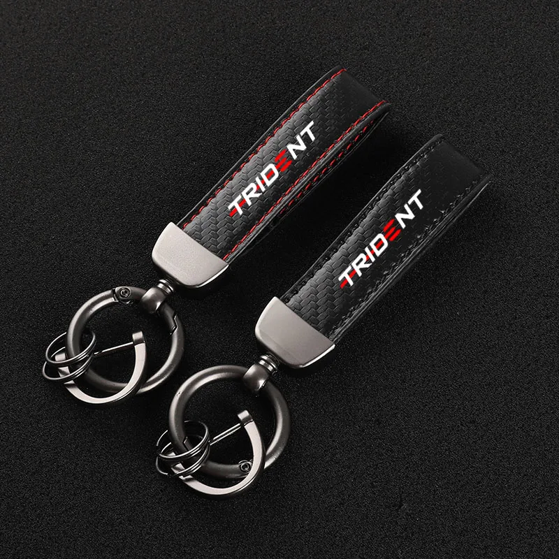 Carbon fiber motorcycle keychain detail close up hexagonal texture