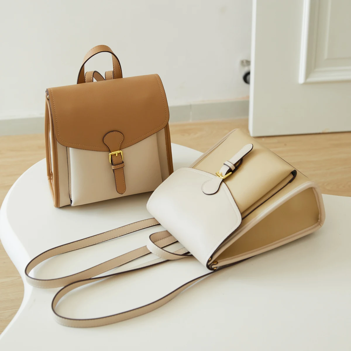 Women's Stylish Two - tone Leather Backpack with Gold tone Buckle Detail Ideal for Daily and Fashionable Looks - 2