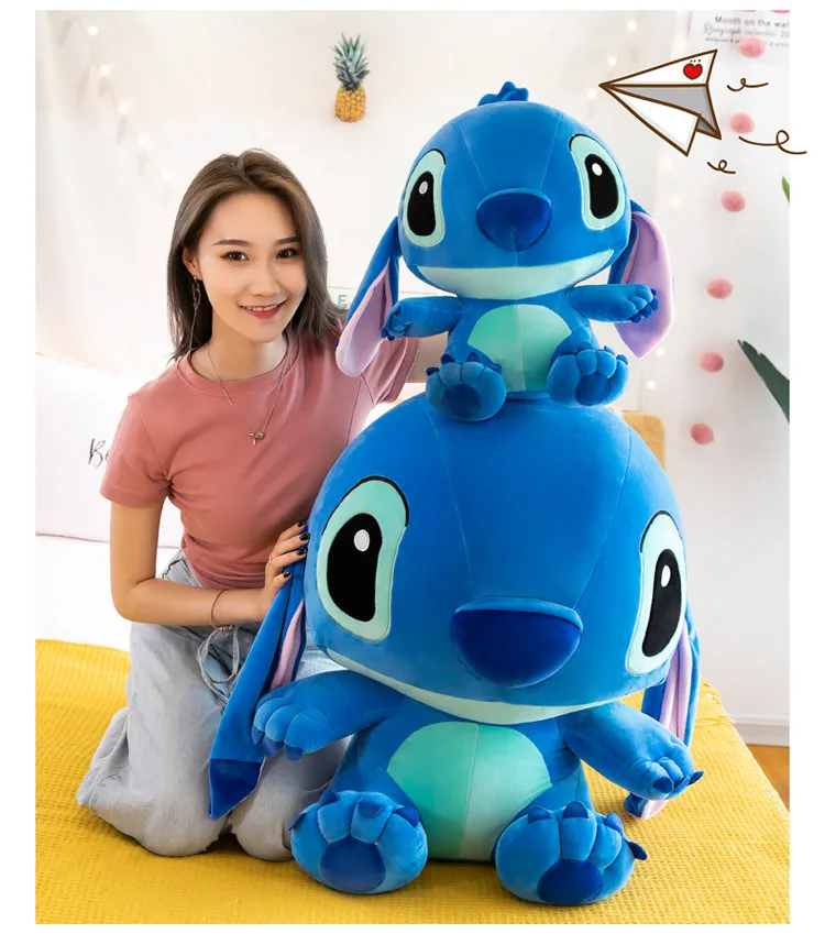 Kawaii Stitch plush toy in pink and blue, available in 25–55cm sizes, soft-filled and designed as an anime-style doll or pendant for kids and collectors. 3