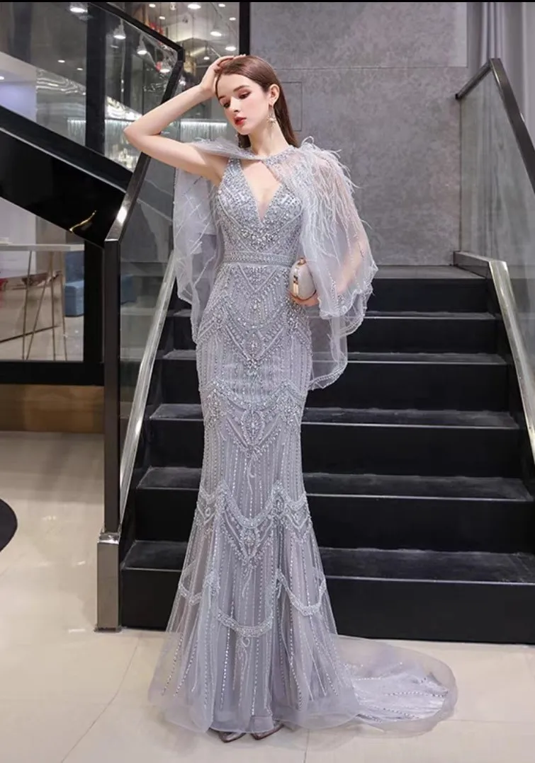 فستان سهرة مطرز بالخرز الوردي، فستان صفارة الإنذار...