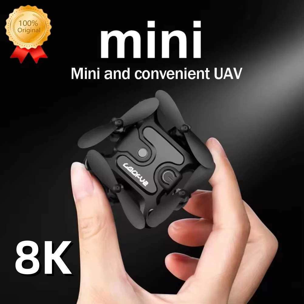 Mini Drone Professionnel 8K Noir plié posé sur une surface, mettant en valeur sa compacité et son design épuré.