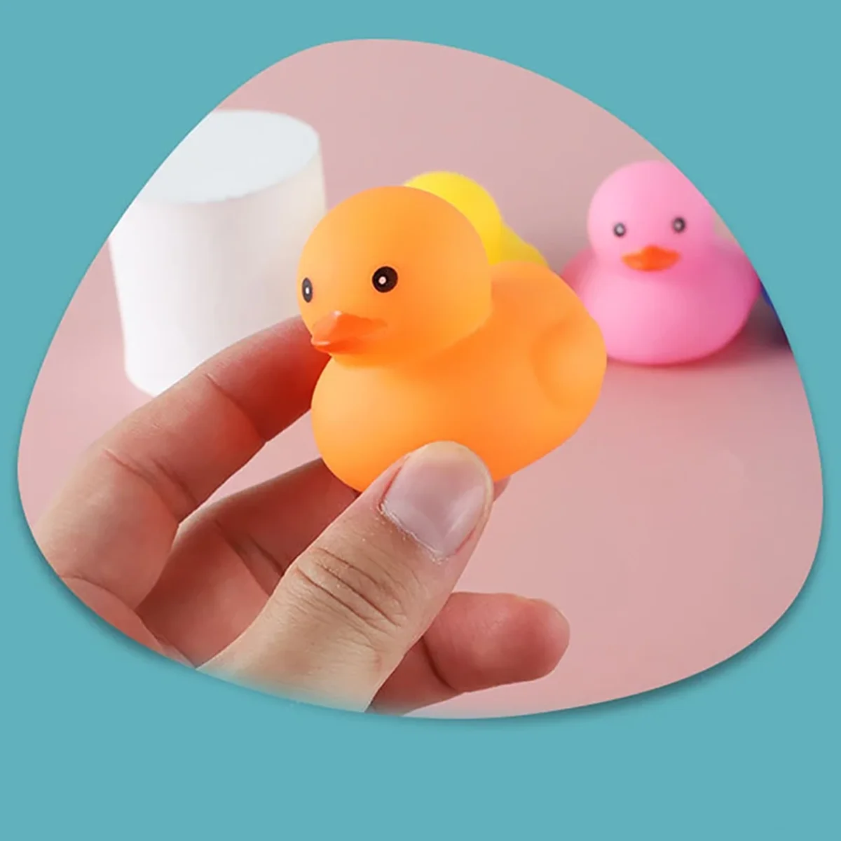 1 random colored mini pet sound toy in the shape of a duckling, squeaking sound