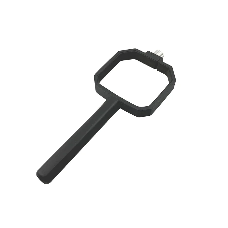 Poignée de maintien pour drone DJI Mini 3 et Mini 3 Pro, vue rapprochée montrant le mécanisme de fixation au drone.