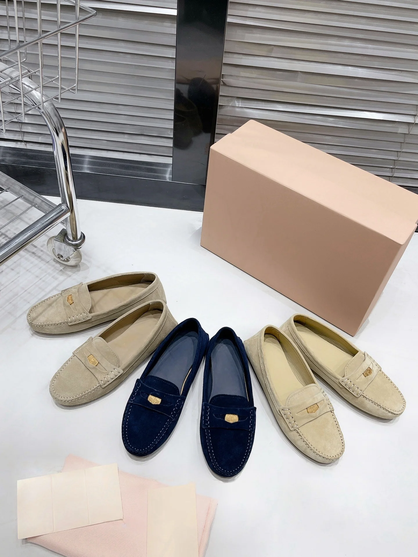 

Early Spring 2024 runway model gold coin loafers in vintage aged suede leather are comfortable to wear and stylishly versatile.