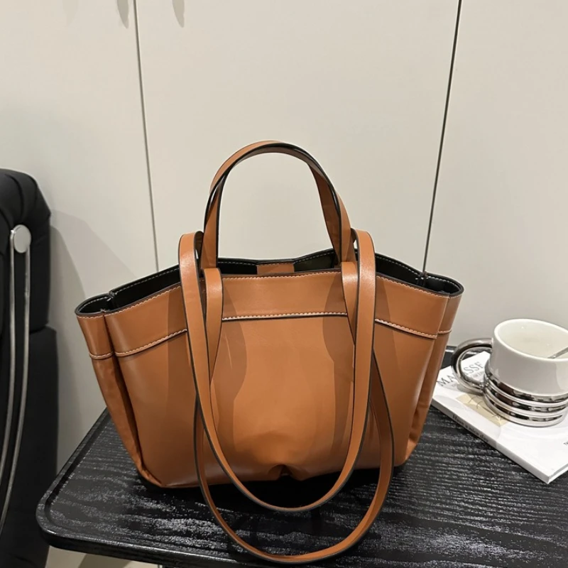Elegant leather handbag with simple design 2 in 1, large capacity shoulder bag with top handle, spacious bag for work, travel, and...