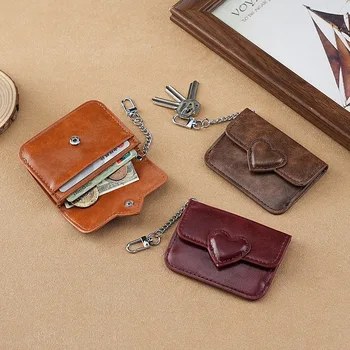 Porta carte in pelle PU Porta carte da donna Portafoglio piccolo a forma di cuore carino Porta carte multi-carta antimagnetico Portamonete da viaggio