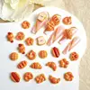 30PCS Cute Creative Sausage Bread Nail Art Decorations Simulated Smiley Toast Cat Paw Bread Dessert Series Nail Charms DIY Nails 5