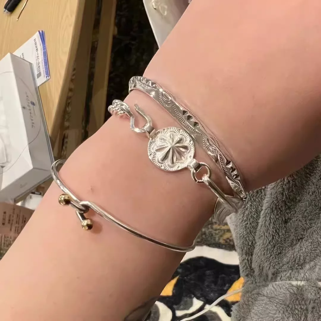 Larry sm1th wind cut feather bracelet