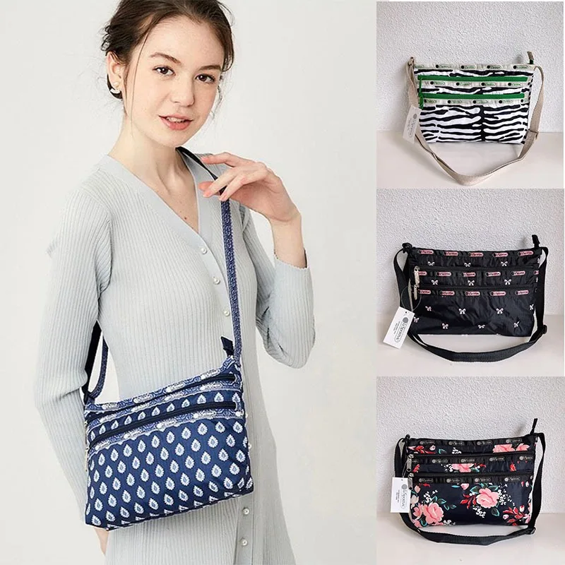 

Lesportsac Co Фирменная аниме мультяшная Милая печать для отдыха путешествий через плечо тканевая сумка многоцветная подарок на день Святого Валентина