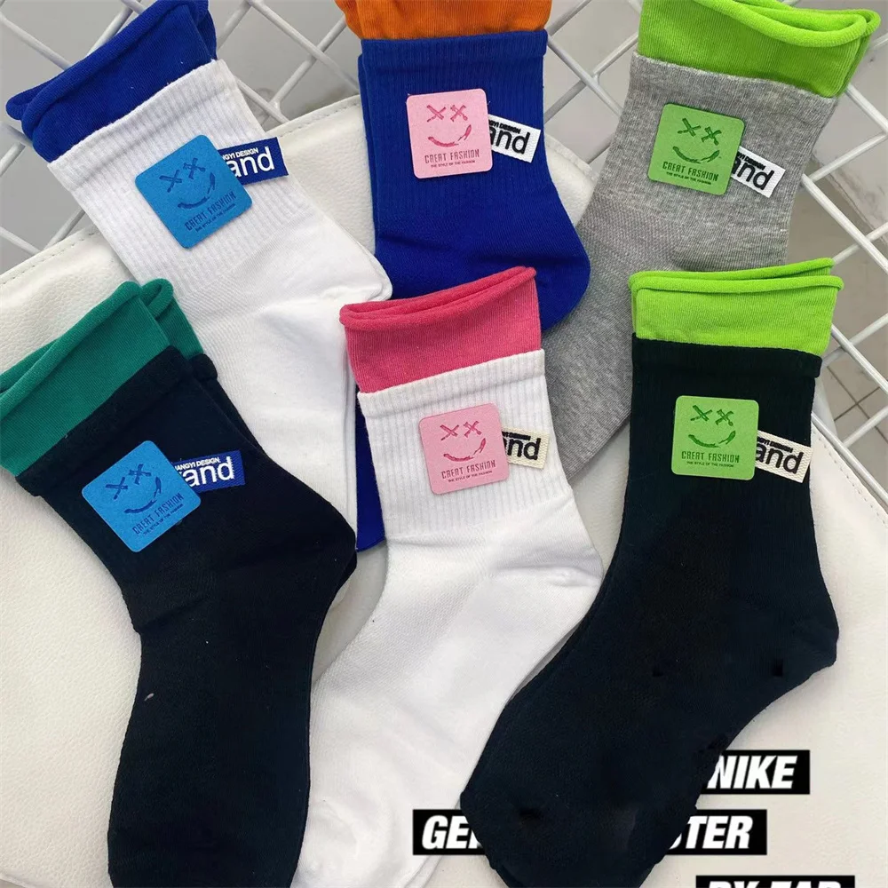 

New trend socks DIY letter smiling face leather label leisure fashion comfortable breathable sports couple socks