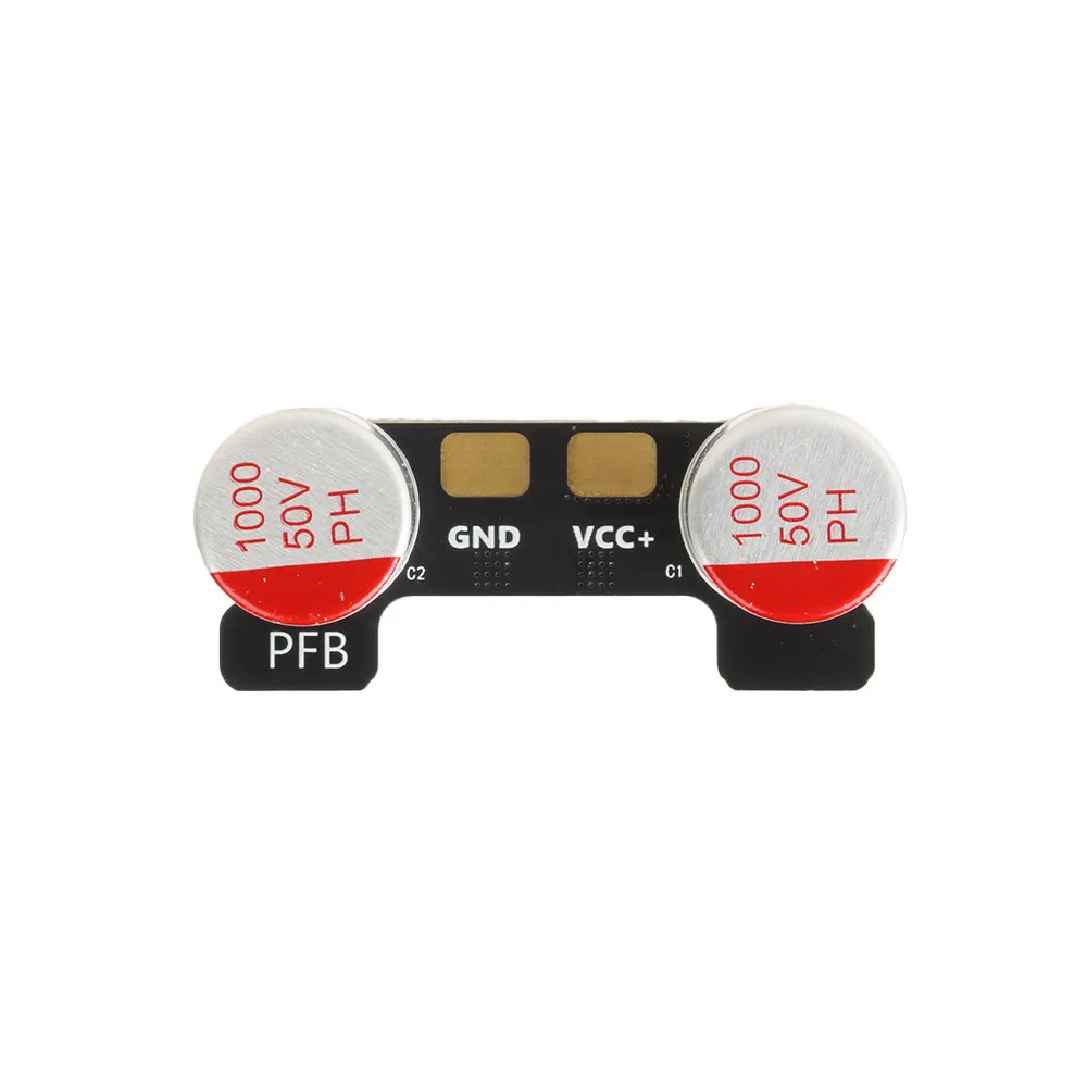 Gros plan sur un condensateur RUSHFPV PFB PRO Dual 50V 100µF, montrant la texture et les détails du boîtier.
