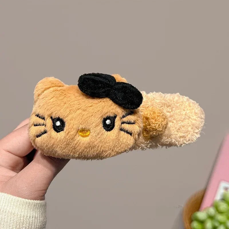 Brown KT cat ball plush hairpin