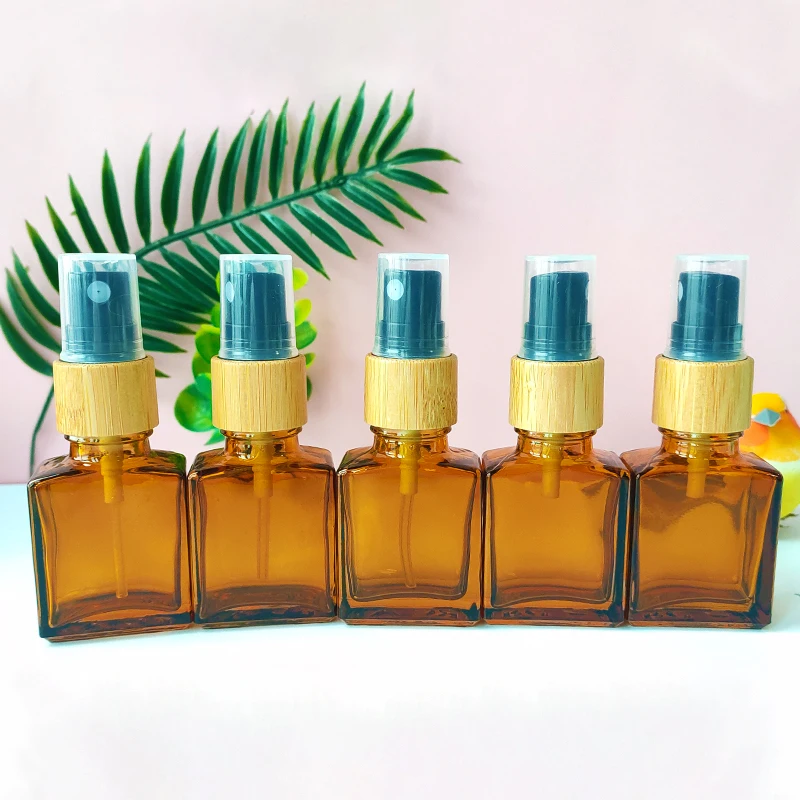 

Wholsesale!15ml 1OZ Square Glass Serum Bottle with Eye Pipette Dropper Amber Refillable Press Pump Spray Vials Bamboo Cap Travel