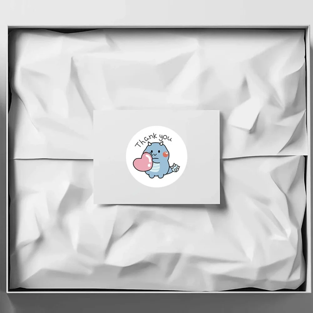 Sticker roll with multiple dinosaur patterns