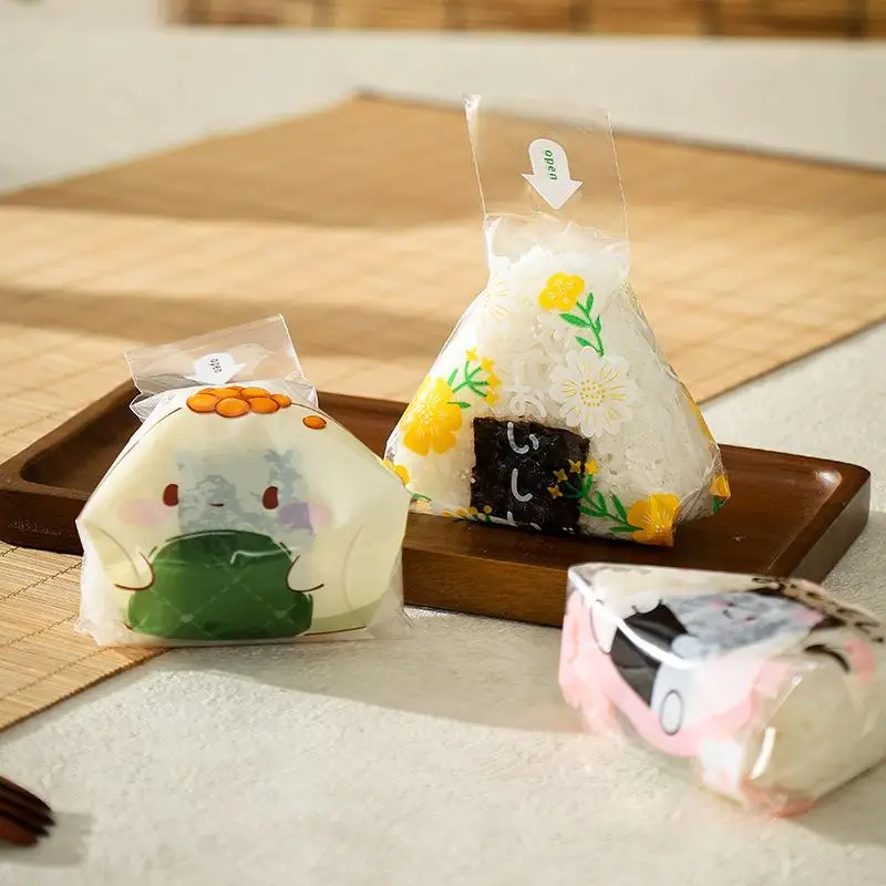 100Pcs 스시 가방 사랑스러운 일본식 삼각형 쌀 공 일회용 포장 가방 스시 만들기 금형 도시락 액세서리
