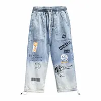 Vêtements coréens hommes lettre imprimé jean taille haute Baggy jean dessin animé Graffiti Hip-Hop pantalon jean bleu 2