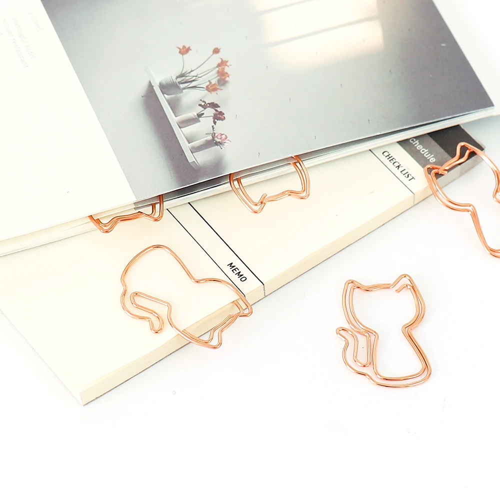 Рисунок 5 - креативные Золотые зажимы для бумаги