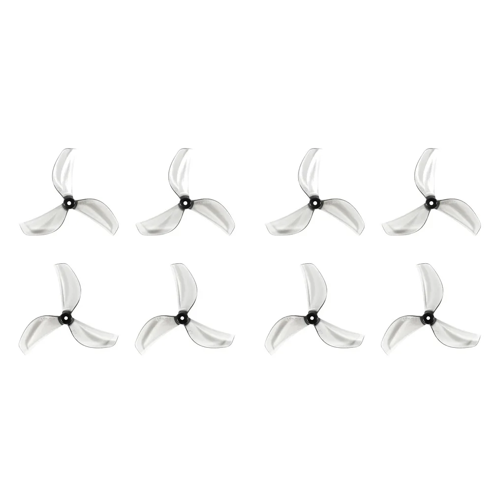 Ensemble de 8 hélices de drone FPV micro en Grey, disposées en éventail sur fond gris.