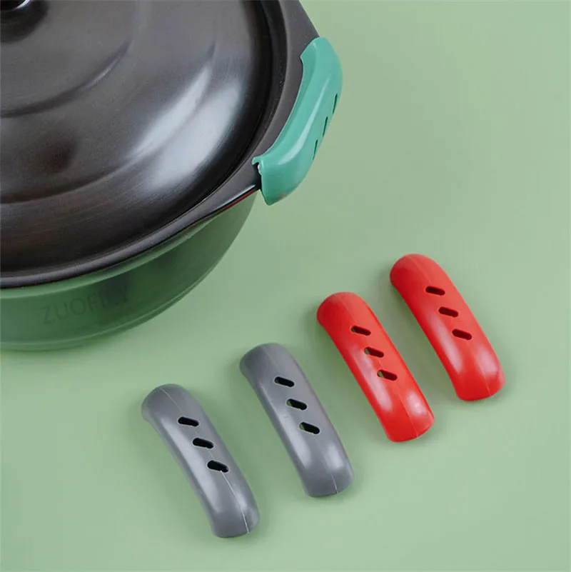 https://ae01.alicdn.com/kf/S53707e3bde654ed28927ac23bba6efd5R/2-4Pcs-Silicone-Heat-Insulation-Oven-Mitt-Glove-Casserole-Ear-Pan-Handle-Holder-Oven-Grip-Anti.jpg