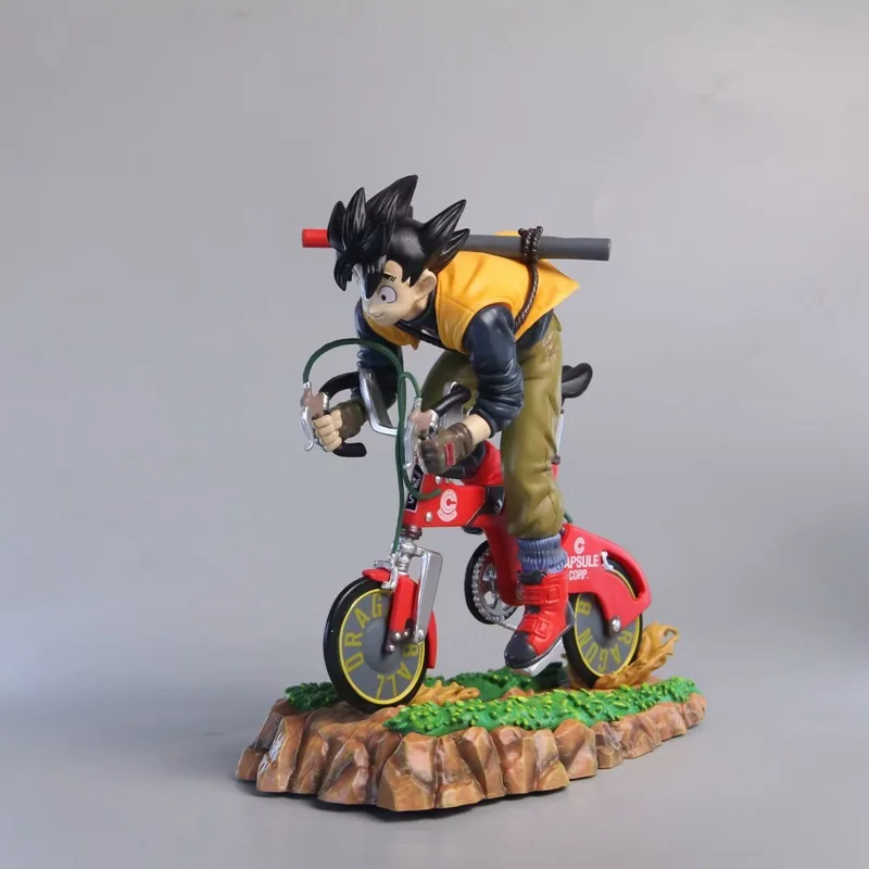 Statue / Figurine ¤ DRAGON BALL Z ¤ SON GOKU en vélo 21 cm