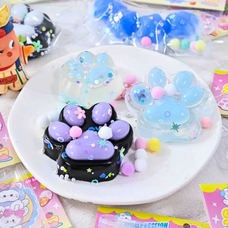 1Pcs Kawaii Cute Cat's Paw TPR Pinch Toy Slow Rebound Blingbling Squeeze Decompression Toy Transparent Cube PU Sensory Toy Gifts 2