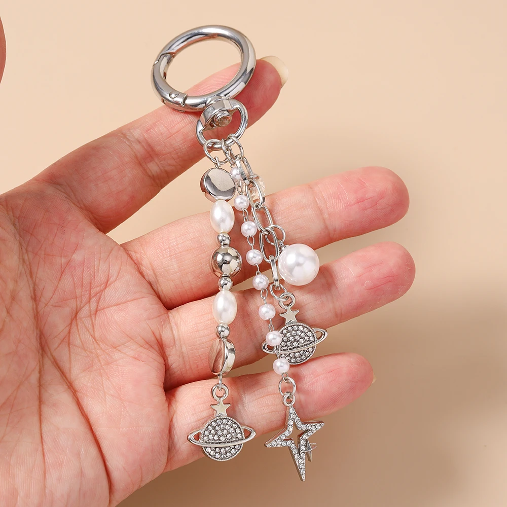 Aihua Niedlicher Kristall-Stern Schlüsselanhänger Perlen-Eiffelturm Schlüsselring Anhänger für Frauen Mädchen Handtaschen-Deko Charms DIY Schmuck