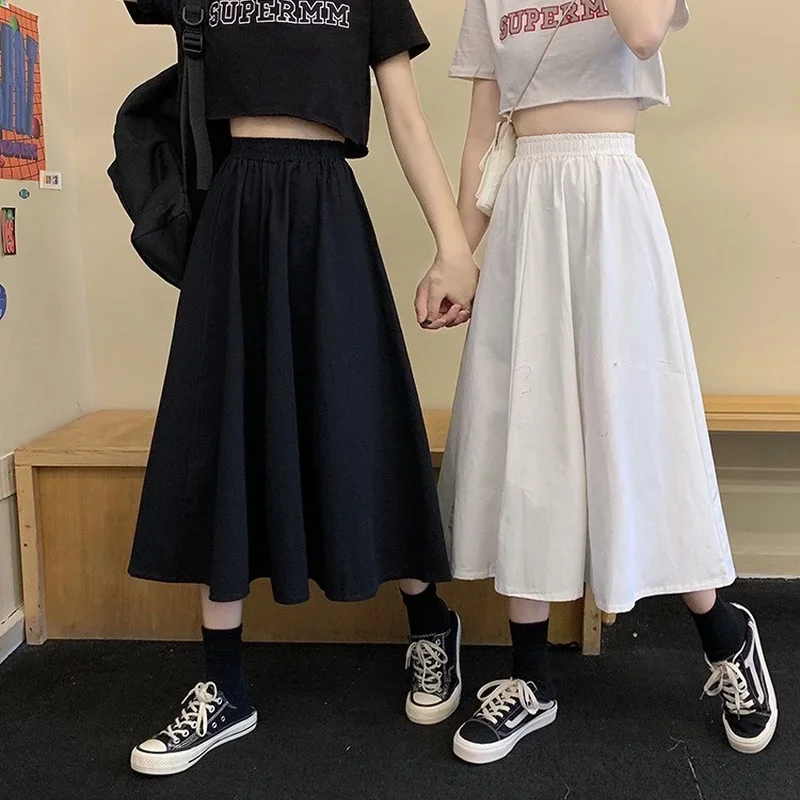 

Spring and Summer Women Casual Midi Skirts Korean Fashion Solid Color Loose Wide Elastic High Wiast A-line BF Streetwear 2023