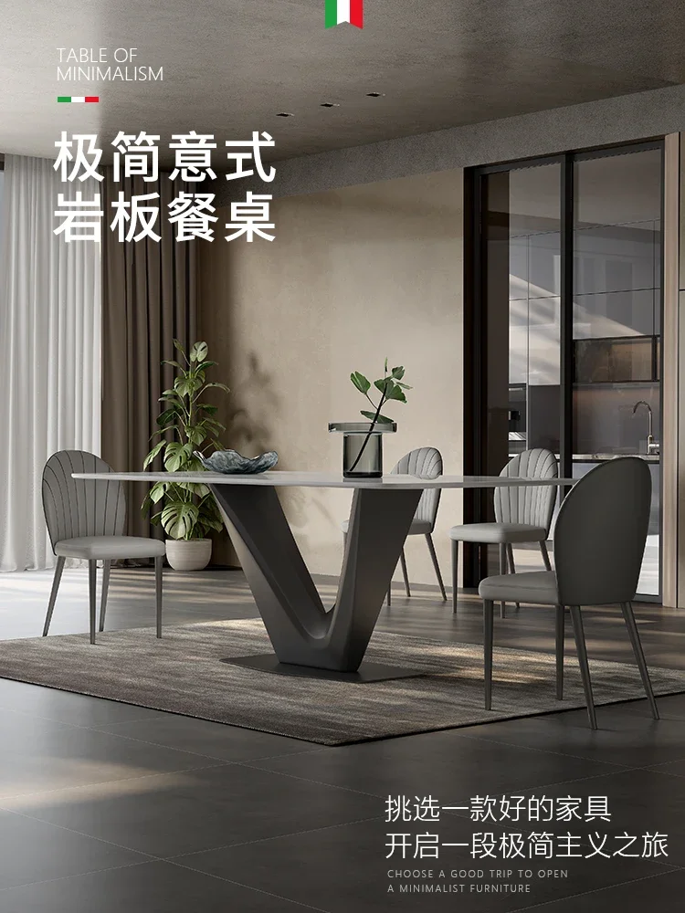 

Bright rock plate dining table 2022 new small household type modern simple high-end black Italian minimalist dining tab