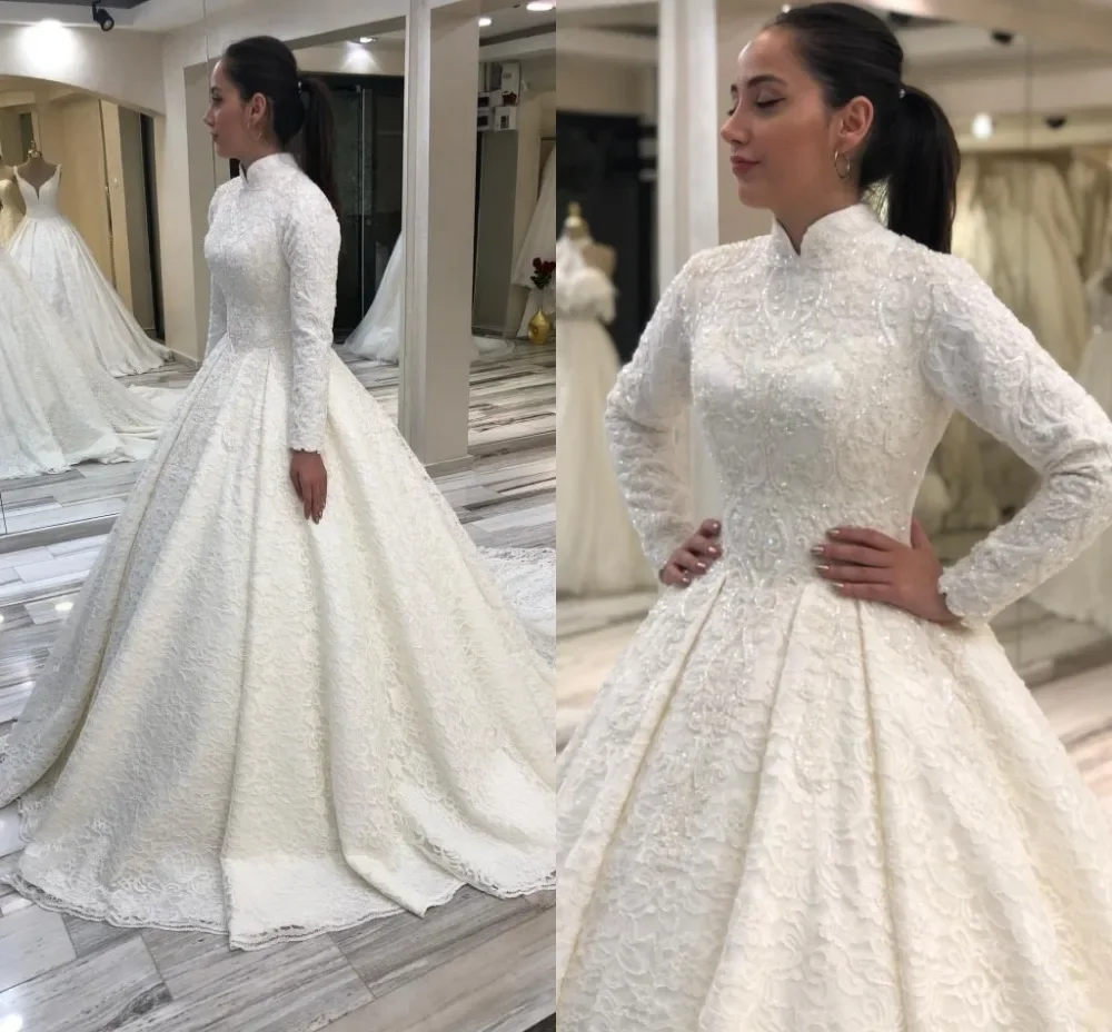 Gorgeous white wedding dress with high neck long sleeve lace applique beaded pearl floor-length bridal gown for women luxury sequin pearl strapless long sleeve wedding ball gown glitter lace floor length mermaid train italian dubai bridal dress