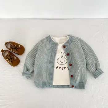 Autumn new 0-3-year-old baby clothes, girls and boys two-color Twists braid knitting round neck long sleeved cardigan