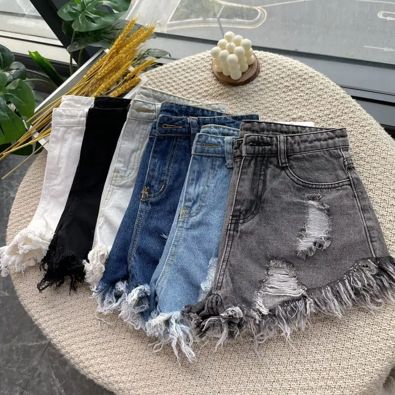 

2024 Summer New High Waist Tassel Hole Denim Shorts Women Korean Version Raw Edge Wide Leg Loose Black Blue Jean Shorts Female