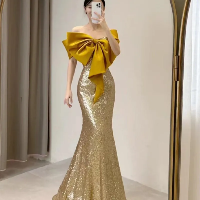 

Golden female sense banquet host Light luxury niche will sequin fishtail dress toasting