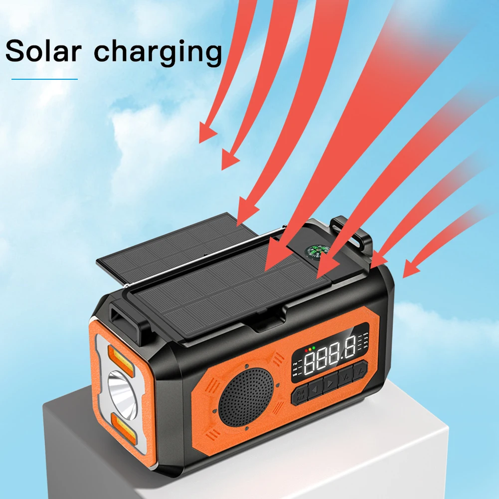 Radio Solaire Portable, Main Manivelle Self Powered AM/FM/SW1/SW2 Radio, avec 4-LED Lampe de Poche et Chargeur de Téléphone - TV Son Photo