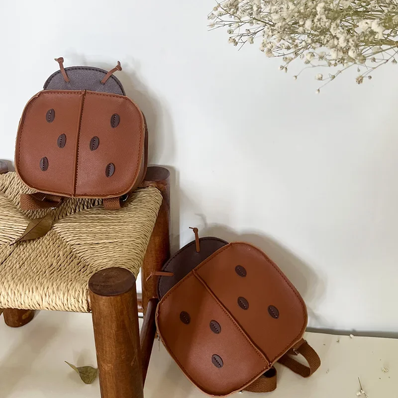 Handmade three-dimensional ladybug shaped backpack for children concave shaped baby accessory bag