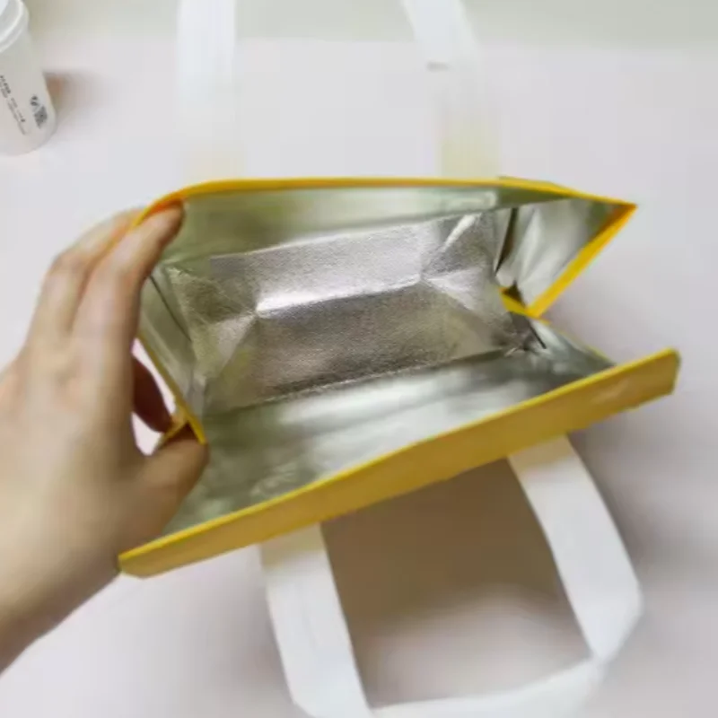 Wholesale 500pcs Custom Logo Reusable Non-Woven Thermal Cooler Bags – Insulated Picnic ... - SKU RNTB1655 - UGI Packaging