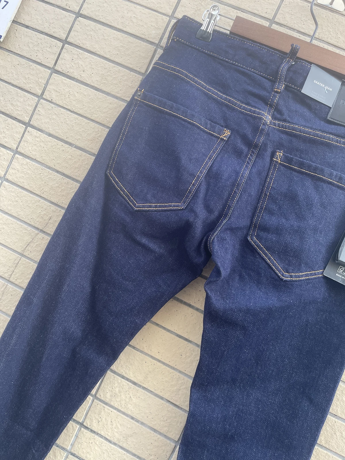 Spring/Summer 2024 New D2 Jeans Trendy Men's Wash Print Roll Pant Feet Paint Slim Fit Small Feet Dark Blue Denim Pants Men