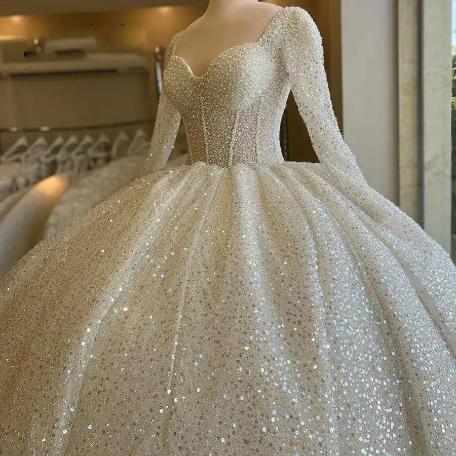 

Gorgeous Square Neckline Full Pearls Puffy Wedding Gowns Court Train Illusion Long Sleeves Shinny Beads Sequins Bridal Dress